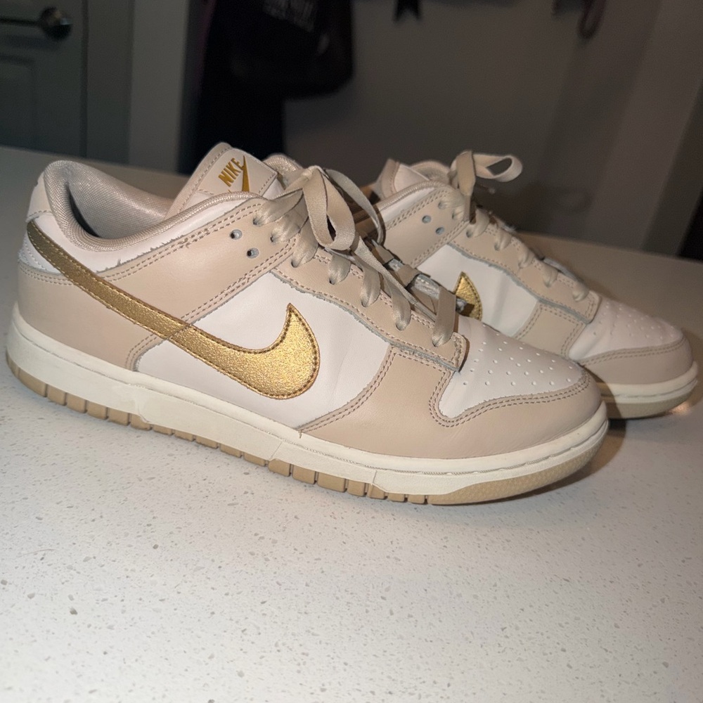 Nike Dunk Low “Gold Swoosh” Sneakers